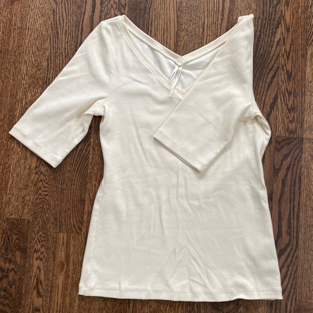 Cream Anthropologie brand sweater